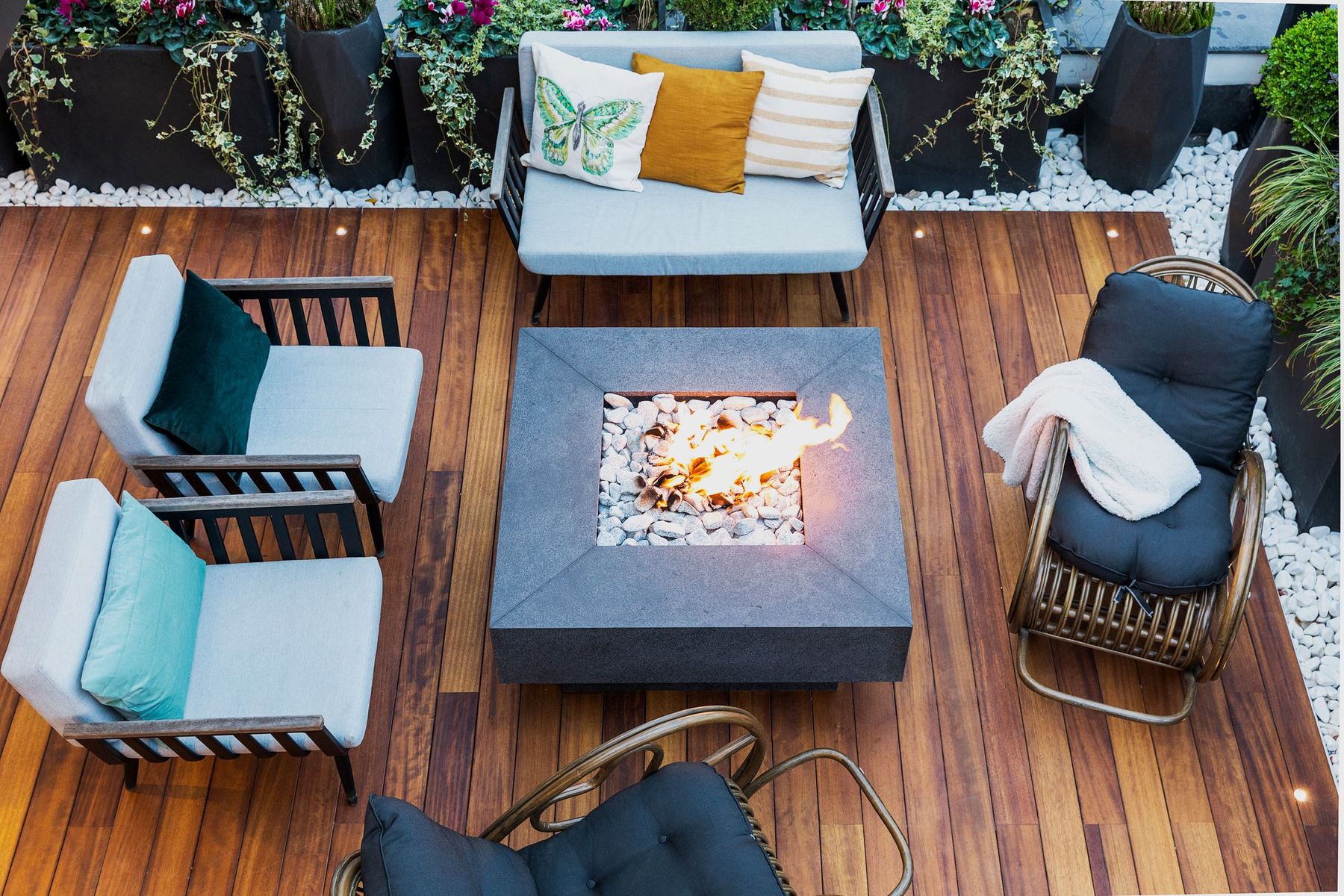Evening on a custom outdoor living space with fire feature