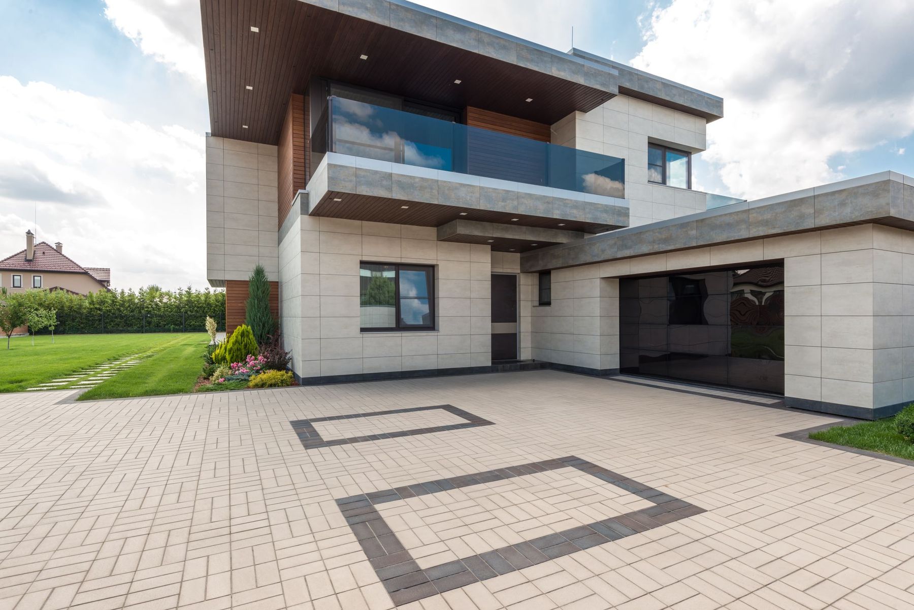 A minimalist custom home exterior with clean architectural lines
